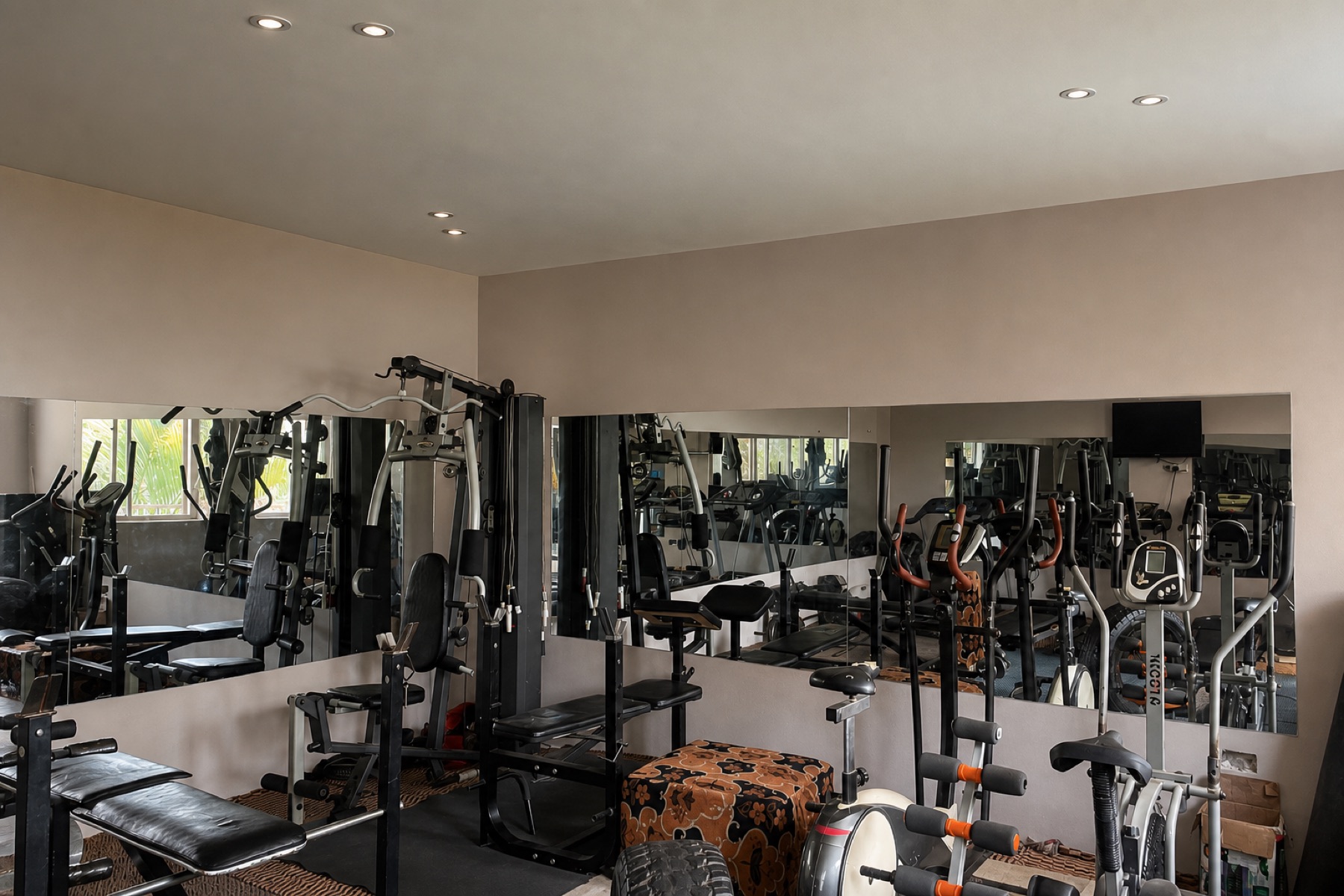 Weights and machines in the gym at Maganjo