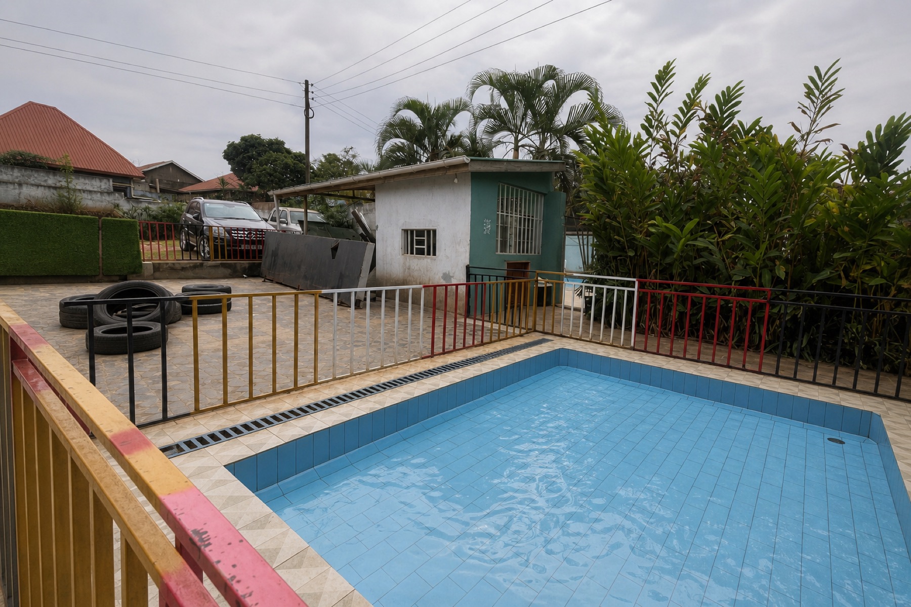 The children's pool at Maganjo, fenced, next to the main pool